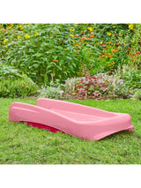 Angled view of the pink and redfolding first slide on grass