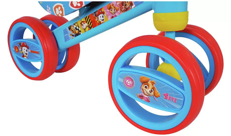 Close up of PAW Patrol Bobble Ride On front wheel, blue frame and character graphic