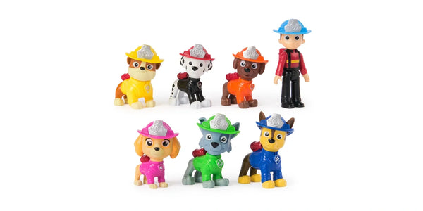 Ryder and six PAW Patrol pup figures grouped together in fire rescue outfits