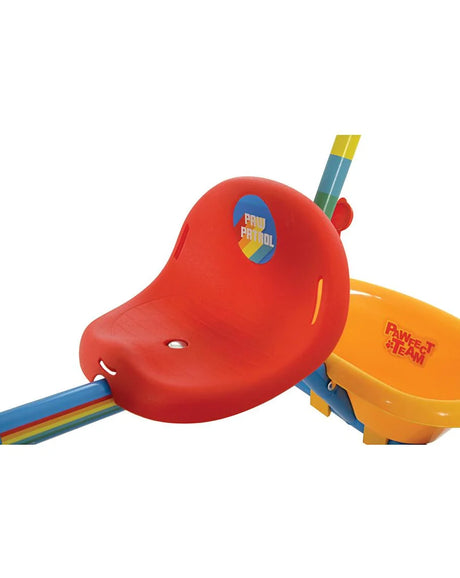Close up of PAW Patrol My First Trike red seat, orange rear bucket and rear wheel