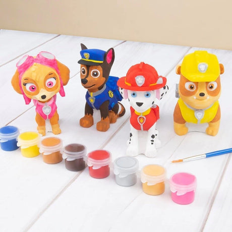 Painted Skye, Chase, Marshall and Rubble figures shown with paint pots and brush