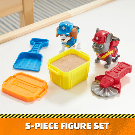 Paw Patrol Rubble & Crew Build-It Figure Pack showing two figures, sand tub and construction tools