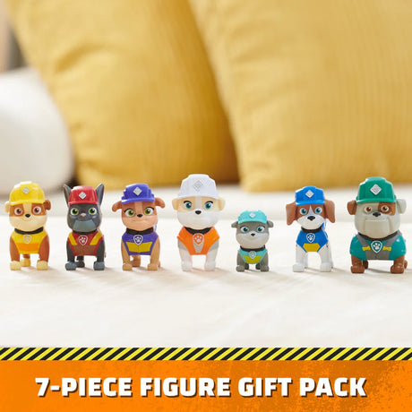 Paw Patrol Rubble & Crew Construction Family Figure Gift Pack showing 7 pup figures in a line