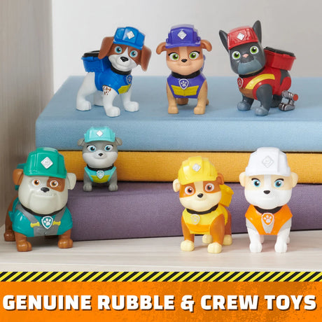 Paw Patrol Rubble & Crew Construction Family Figure Gift Pack with 7 pup figures displayed on coloured steps