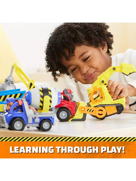 Paw Patrol Rubble & Crew Rubble’s bulldozer shown with other Rubble & Crew toy vehicles