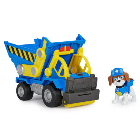 Paw Patrol Rubble & Crew Wheeler’s dump truck with Wheeler figure on a white background