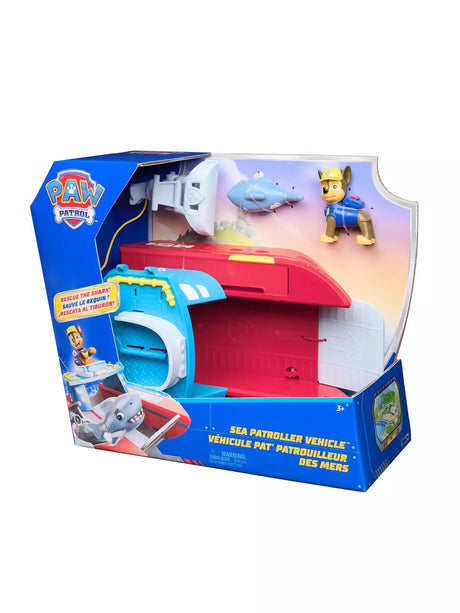 PAW Patrol Sea Patroller Vehicle in retail box showing the red and blue boat, rescue shark cradle and Chase figure, with PAW Patrol branding and age 3 plus label