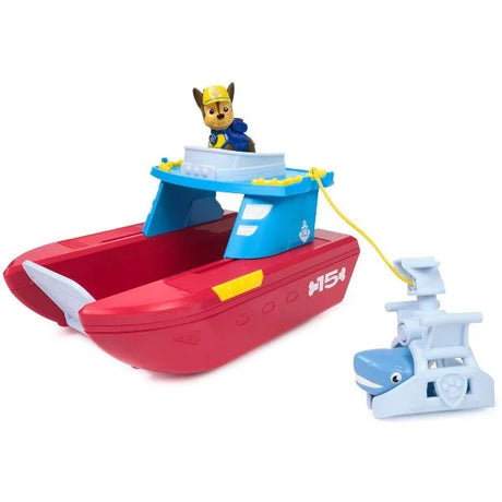 PAW Patrol Sea Patroller Vehicle side view showing red hull, blue command deck with Chase figure at the helm, yellow rescue rope and blue shark rescue cradle attachment