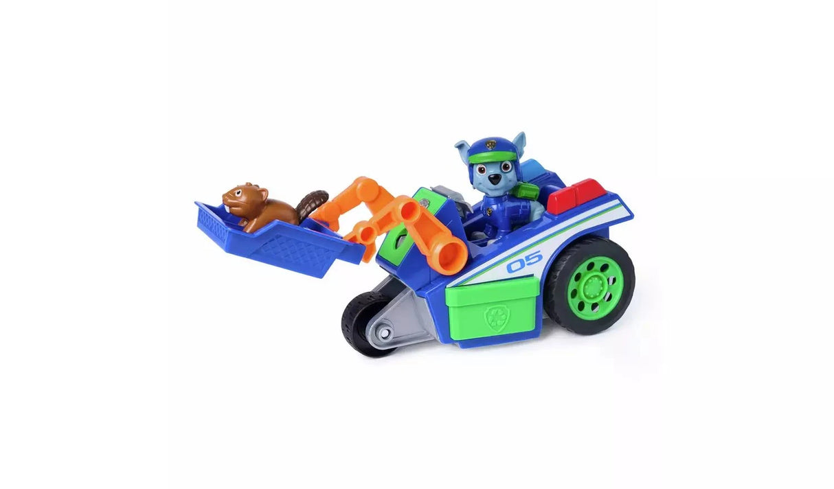 PAW Patrol Rocky Rescue Recycler blue and green vehicle with orange claw arm extended and Rocky figure seated, front angle