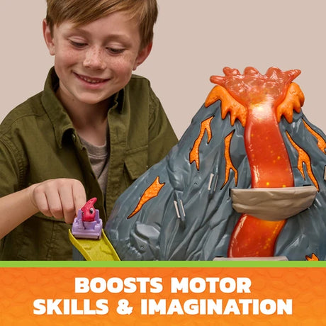 Child playing with a pink dinosaur figure beside the PAW Patrol Super Lava Blast volcano playset
