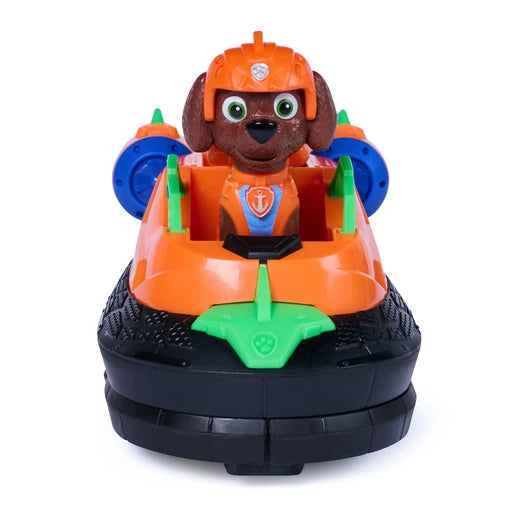 Front view of Zuma seated in the orange Dino Rescue Hovercraft
