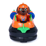 Front view of Zuma seated in the orange Dino Rescue Hovercraft