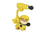 Rubble figure in yellow outfit with launcher and black projectiles