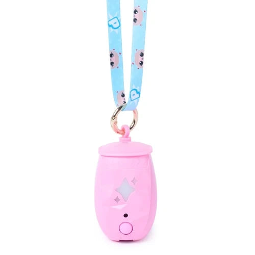 Closed pink Peekimo digital pet pod hanging from a blue patterned lanyard with a metal ring, showing the star shaped panel and circular button on the front.