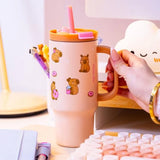 PENfection CAPYBARA cup being held by the handle on a desk
