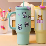 PENfection PANDA cup displayed beside a yellow CHILL cup on a desk