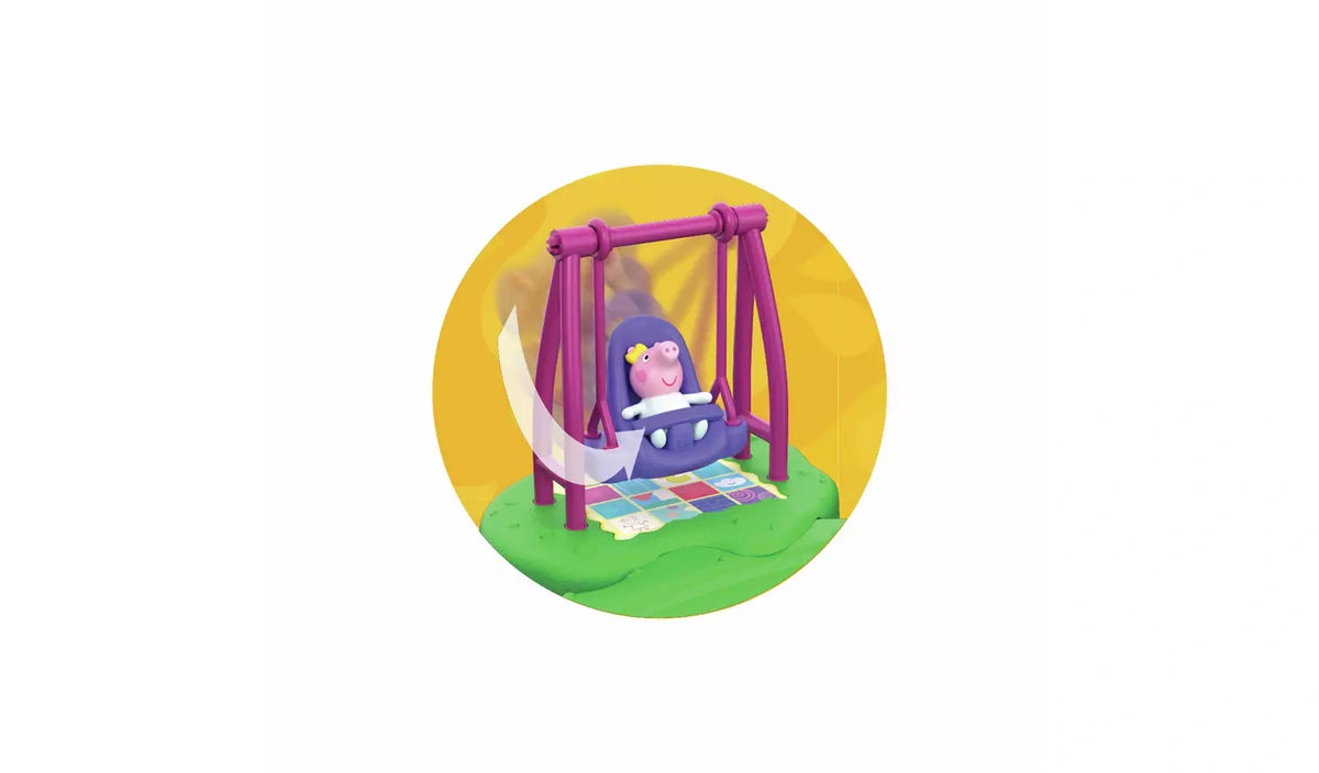 Close-up of baby Evie sitting in a purple swing suspended from a pink frame above a colourful patterned mat on a green base, with a curved arrow illustrating the swinging movement.