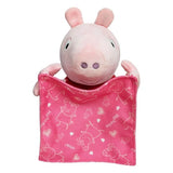 Peppa Pig soft toy facing forward while holding a square pink blanket printed with Peppa Pig characters and hearts
