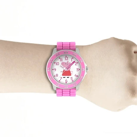 Peppa Pig Time Teacher Watch worn on the wrist showing pink strap, numbered bezel and Peppa Pig analogue dial