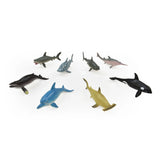 Eight Peterkin Ocean World sea animal figures arranged together, including sharks, an orca, a dolphin and other marine animals 