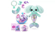 Pets Alive Furmaids Series 1 unboxed contents featuring mint green plush Furmaid with fluffy ears and iridescent sequined mermaid tail, round Furmaids packaging capsule, translucent tail fin piece, bead bracelet, three small mermaid charm figures, slime sachets and collector leaflet on white background