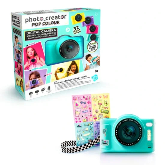 Photo Creator Pop Colour green digital camera displayed beside its retail packaging, with colourful sticker sheets and a black and white chequered strap on a white background.