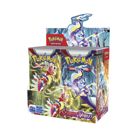 Open Pokémon TCG Scarlet and Violet booster display box on a white background, displaying booster packs arranged inside the cardboard display box