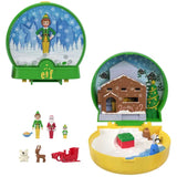 Polly Pocket Elf Compact showing the closed snow globe case with Buddy figure, plus the opened workshop scene and included micro figures and accessories
