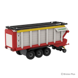 BRIXIES Plus Pöttinger Jumbo viewed from the rear side with the rear panel closed, triple axle wheels and drawbar assembly visible