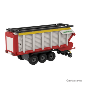 BRIXIES Plus Pöttinger Jumbo viewed from the rear side with the rear panel closed, triple axle wheels and drawbar assembly visible
