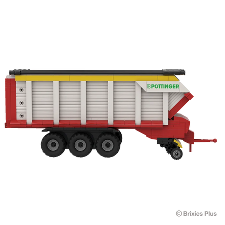 BRIXIES Plus Pöttinger Jumbo loader wagon in full side profile with the drawbar extending to the right, triple axle wheels and grey side panels visible
