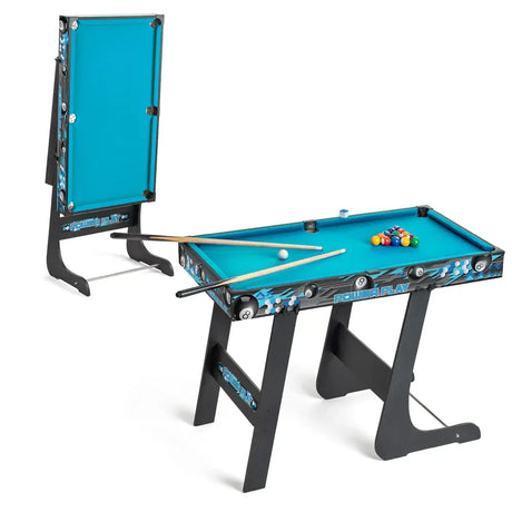 Folding pool table shown upright for storage and set up with balls and cues
