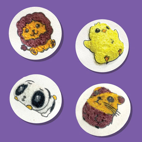Four finished Puffy Art Adorables animal pictures featuring a lion, yellow chick, panda and hamster on a purple background