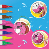 Puffy Art Foodies donut keychain being coloured with the included marker pens and water applicator