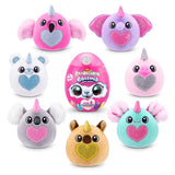 Seven Rainbocorns Eggzania Baby plush characters in assorted colours with glitter hearts arranged around pink Eggzania surprise egg