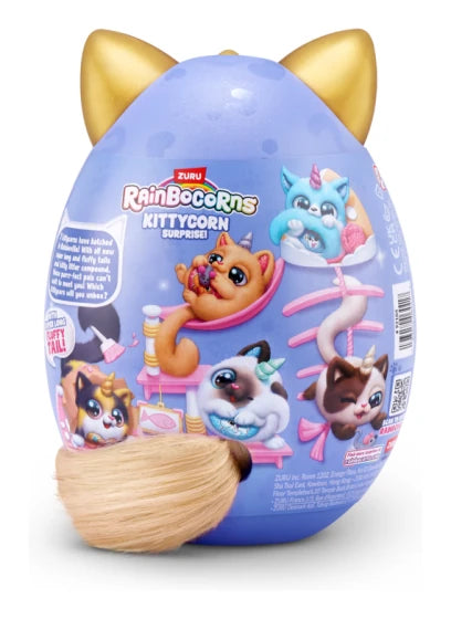 Back of purple Rainbocorns Kittycorn Surprise egg showing illustrated kittycorn characters and product information with plush tail visible at base