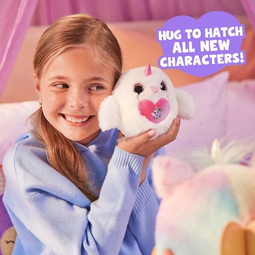 Child holding a white Rainbocorns Magicorn plush