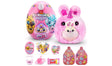 Rainbocorns Mamacorn Surprise pink plush Mamacorn with bunny ears and heart pouch holding baby, shown with egg and included accessories laid out