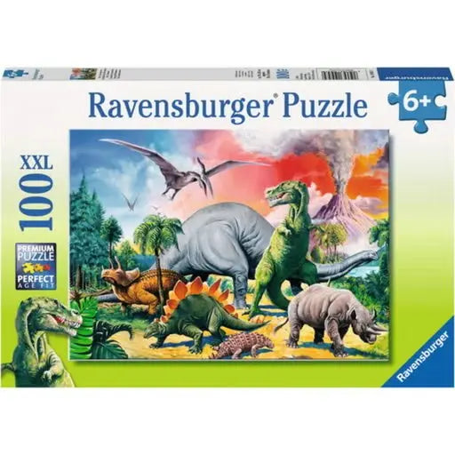 Ravensburger 100 piece XXL puzzle box front for Among the Dinosaurs, aged 6 plus, with Premium Puzzle and Perfect Age Fit badges visible