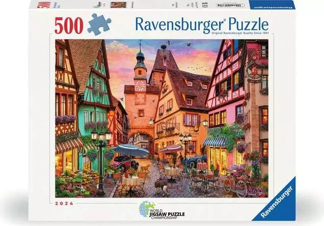 Ravensburger Bavaria Illuminated 500 piece jigsaw puzzle box featuring the colourful Bavarian street scene with half timbered buildings and café tables