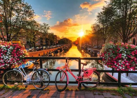 Amsterdam canal puzzle artwork with bicycles on a bridge and sunset light on the water