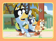 Bluey, Bingo and Bandit riding a skateboard together Ravensburger jigsaw puzzle scene