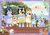 Ravensburger Bluey Giant Floor Puzzle artwork with Bluey, Bingo and the Heeler family together in the garden
