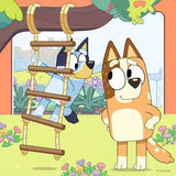 Ravensburger Bluey jigsaw scene with Bluey and Bingo beside a garden ladder