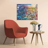 Ravensburger Colourful Cinque Terre 2000 piece jigsaw puzzle displayed framed on a wall above a chair and side table