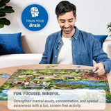Man assembling the Ravensburger Country Farm 1000 Piece Jigsaw Puzzle on a table