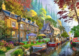 Canal side artwork showing cottages, picnic tables, flowers and narrowboats