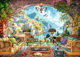 Ravensburger Mediterranean Terrace View puzzle artwork showing a flower filled terrace overlooking a coastal village and blue sea