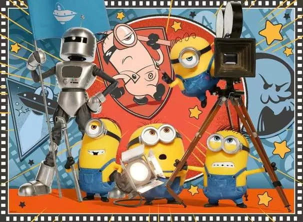 Minions & Monsters scene featuring four Minions around filming equipment with a large movie camera, spotlight and silver robot figure