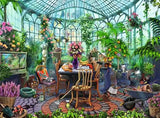 Ravensburger Morning in the Greenhouse puzzle artwork showing a sunlit conservatory filled with tropical plants, flowers, parrots, a table and garden tools